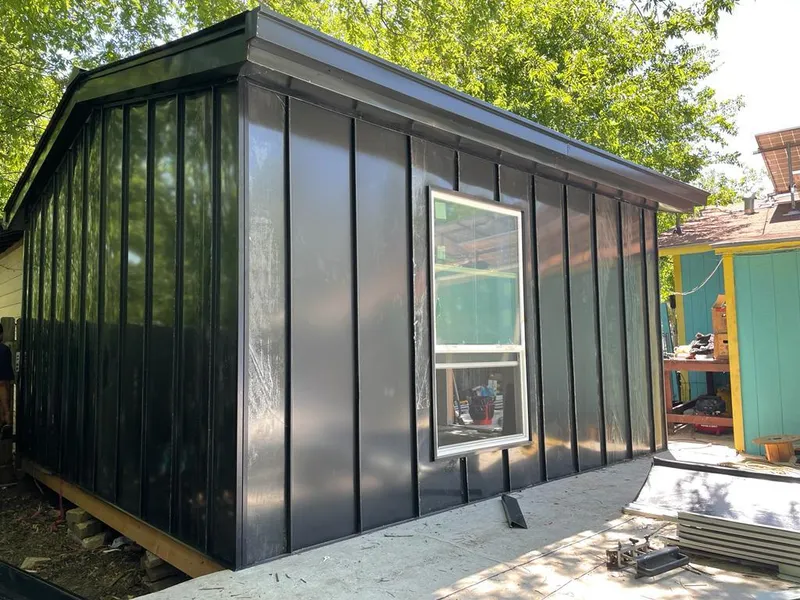 Black standing seam metal wall panels for Metal Roof Installation in Delavan